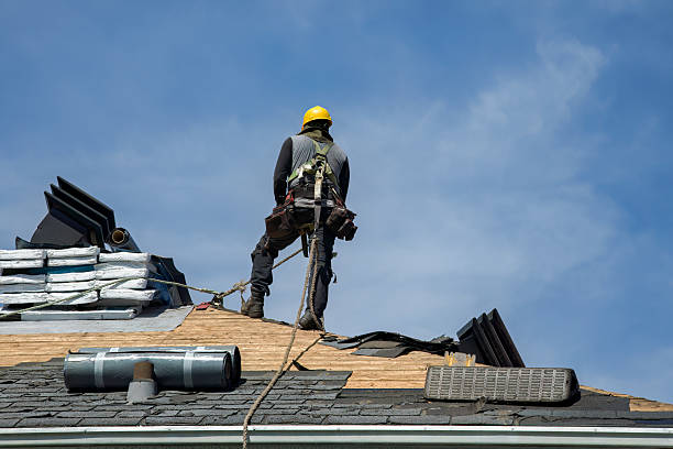 Professional Roofing technician working in North Springfield, PA